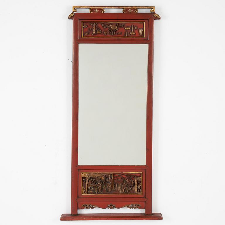 A lacquered mirror, Qing dynasty, 19th century.