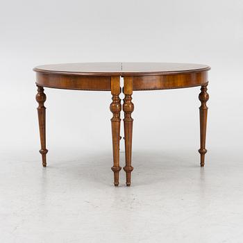 A dining table, late 19th Century.