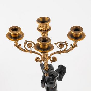 A pair of Empire-style ormolu and marble four-light candelabra, late 19th century.