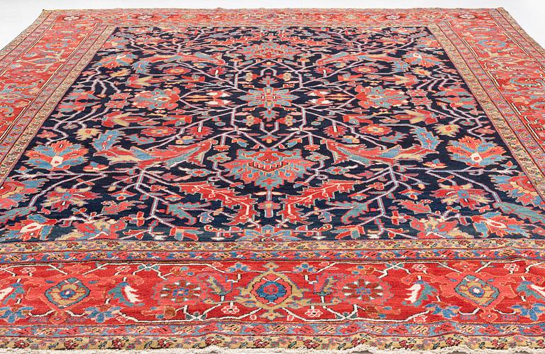 An antique Heriz Serapi, north west Persia, ca 421 x 352 cm.