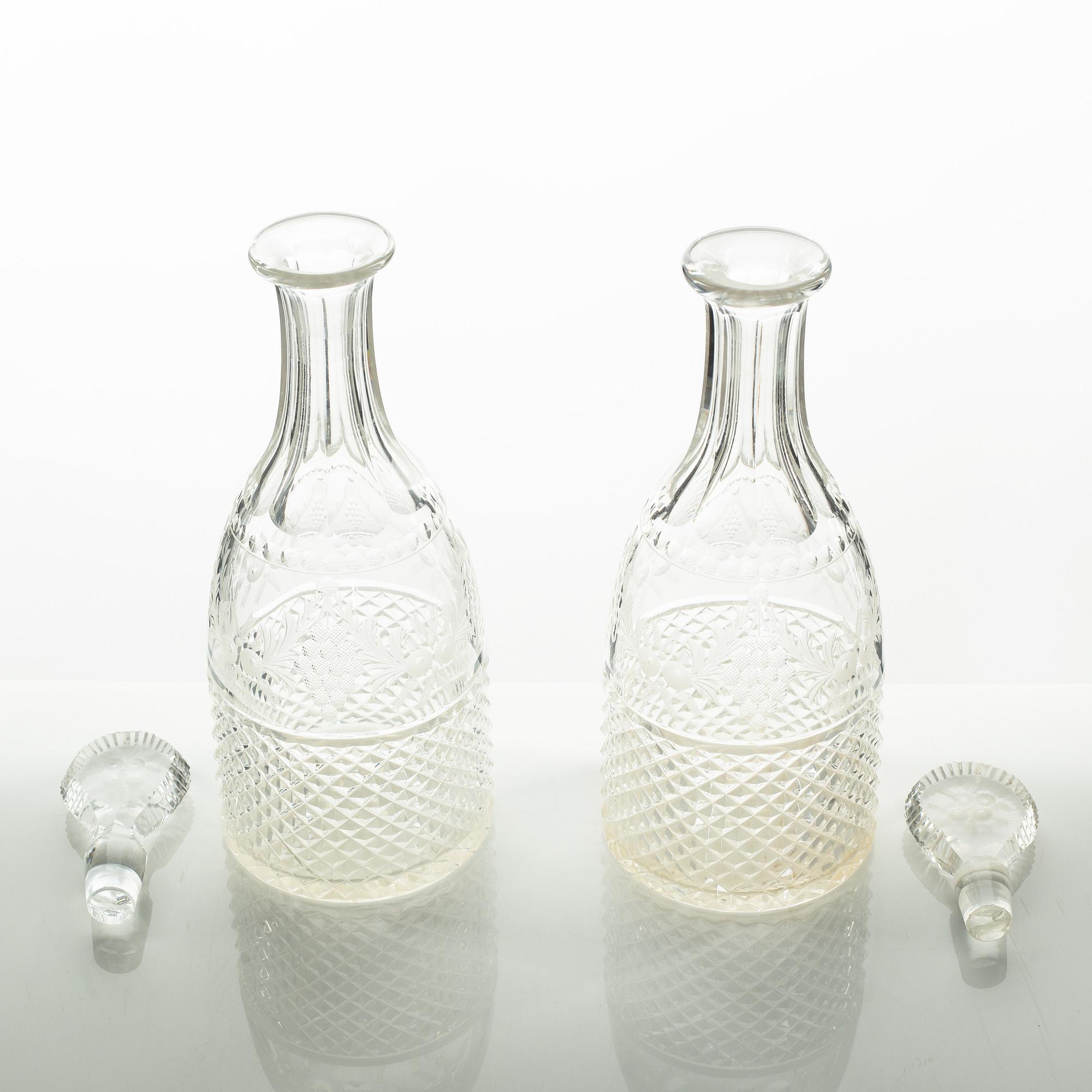 Two glass decanters, around the year 1900.