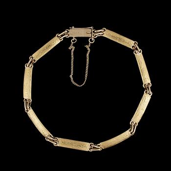 ARMBAND, 18 och 23 k guld. Vikt ca 13 g.