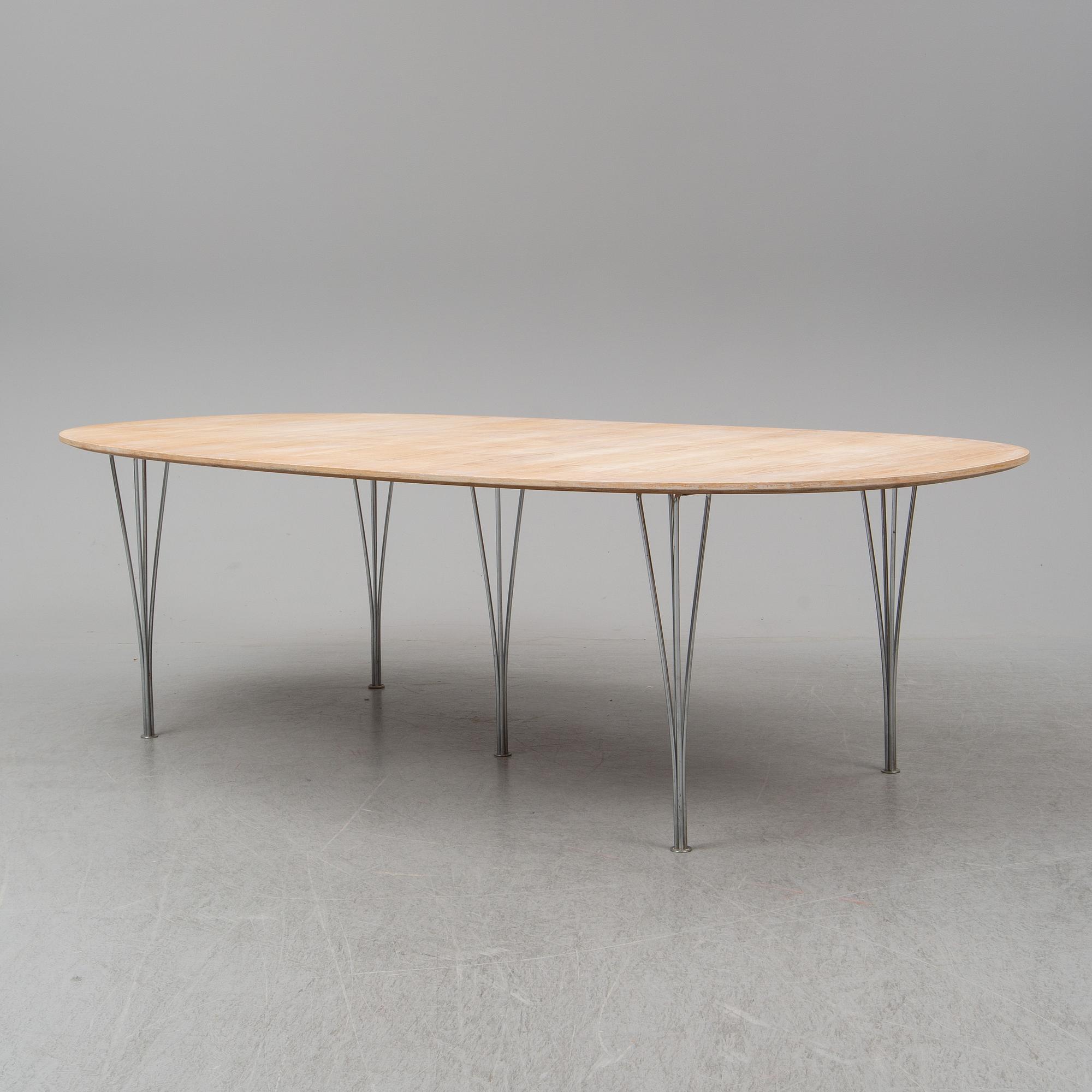 BRUNO MATHSSON & PIET HEIN, a 'Superellips' dining table, Fritz Hansen, Denmark, 1994.