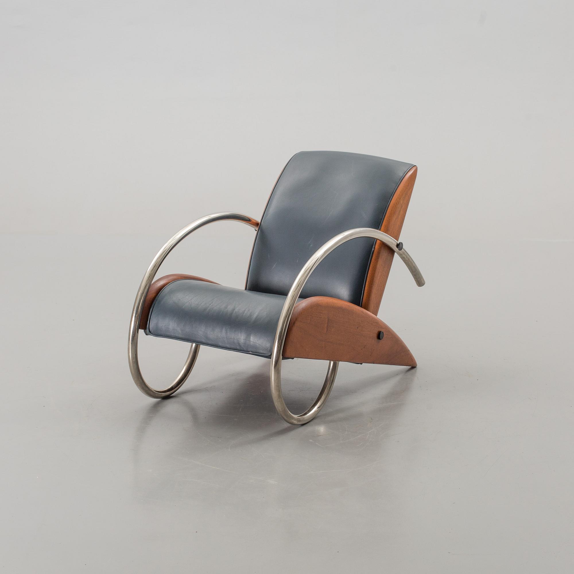 AN "STEAMLINE" ARMCHAIR BY KLAUS WETTERGREN, DENMARK, 1980'S.
