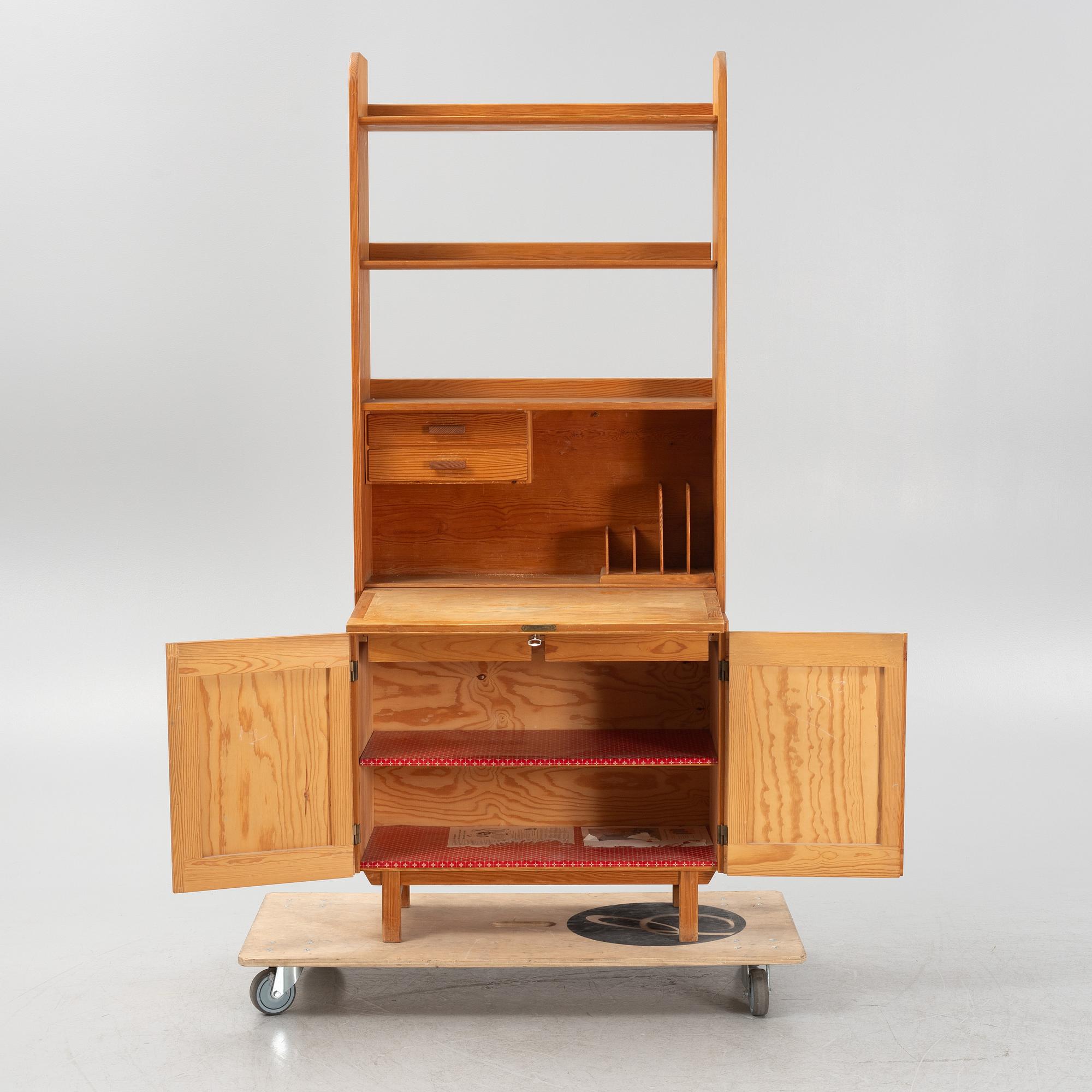Göran Malmvall, a pinewood book case with secretaire and cabinet, second part of the 20th Century.