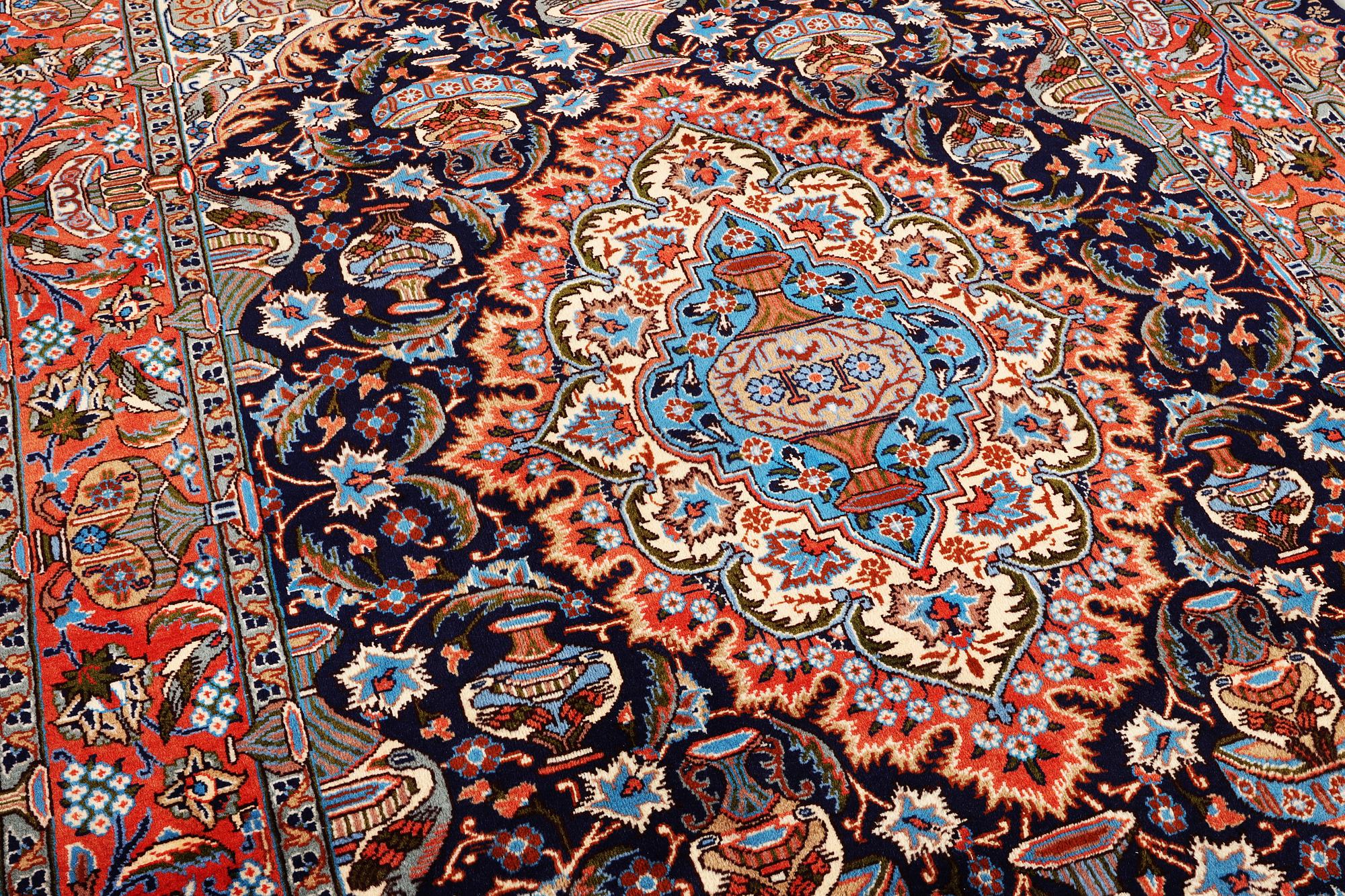 A Kashmar carpet, c. 310 x 203 cm.