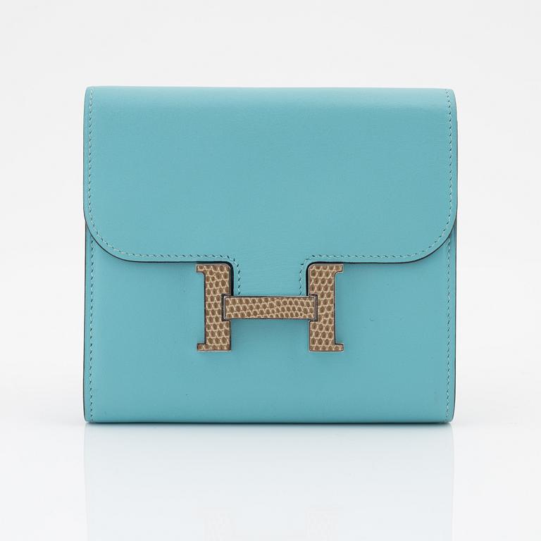 Hermès, a blue leather 'Constance' wallet.