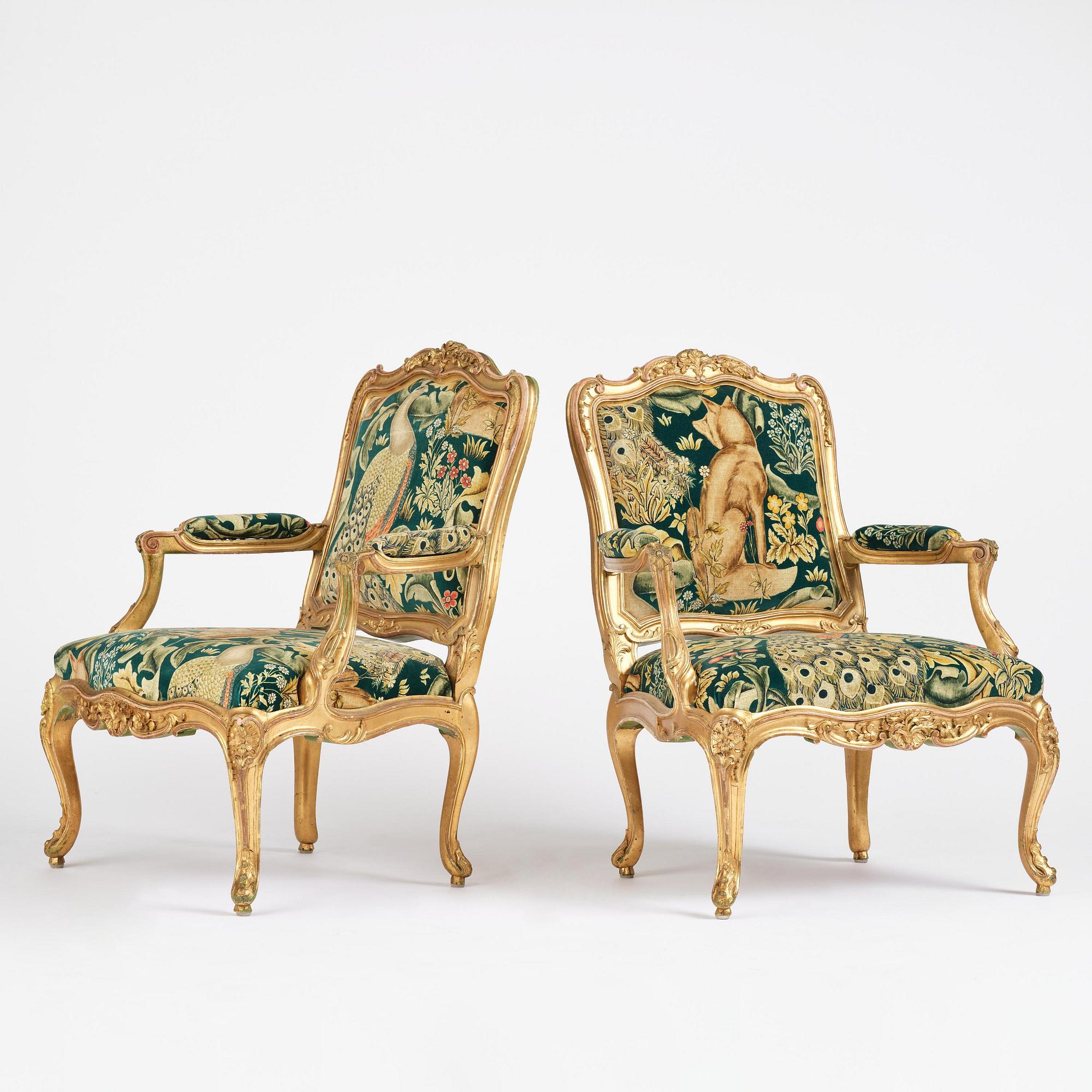 A pair of Louis XV-style giltwood fauteuils, late 19th century.