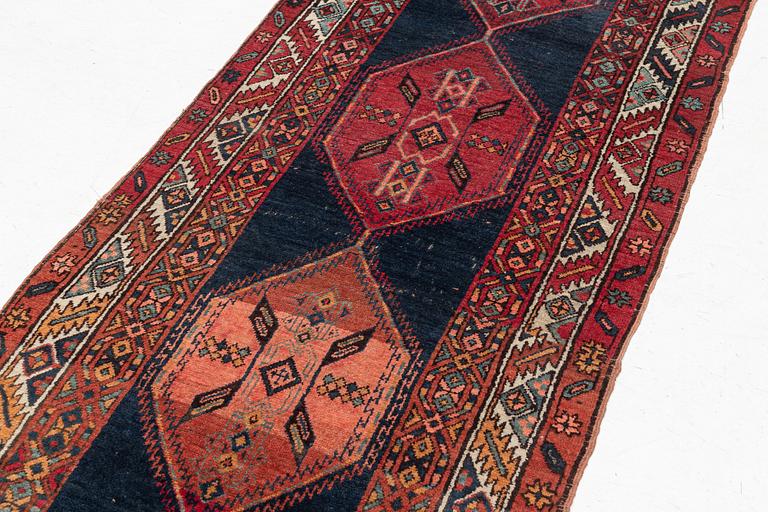 An antique Anatolian/Caucasian runner, c 337 x 99 cm.