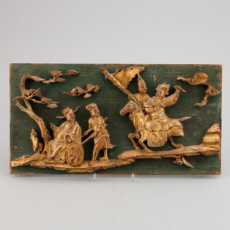 A Chinese wooden wall relief, 20th century.