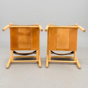 A pair of 1980s ' 411' armchairs for Artek, Finland.