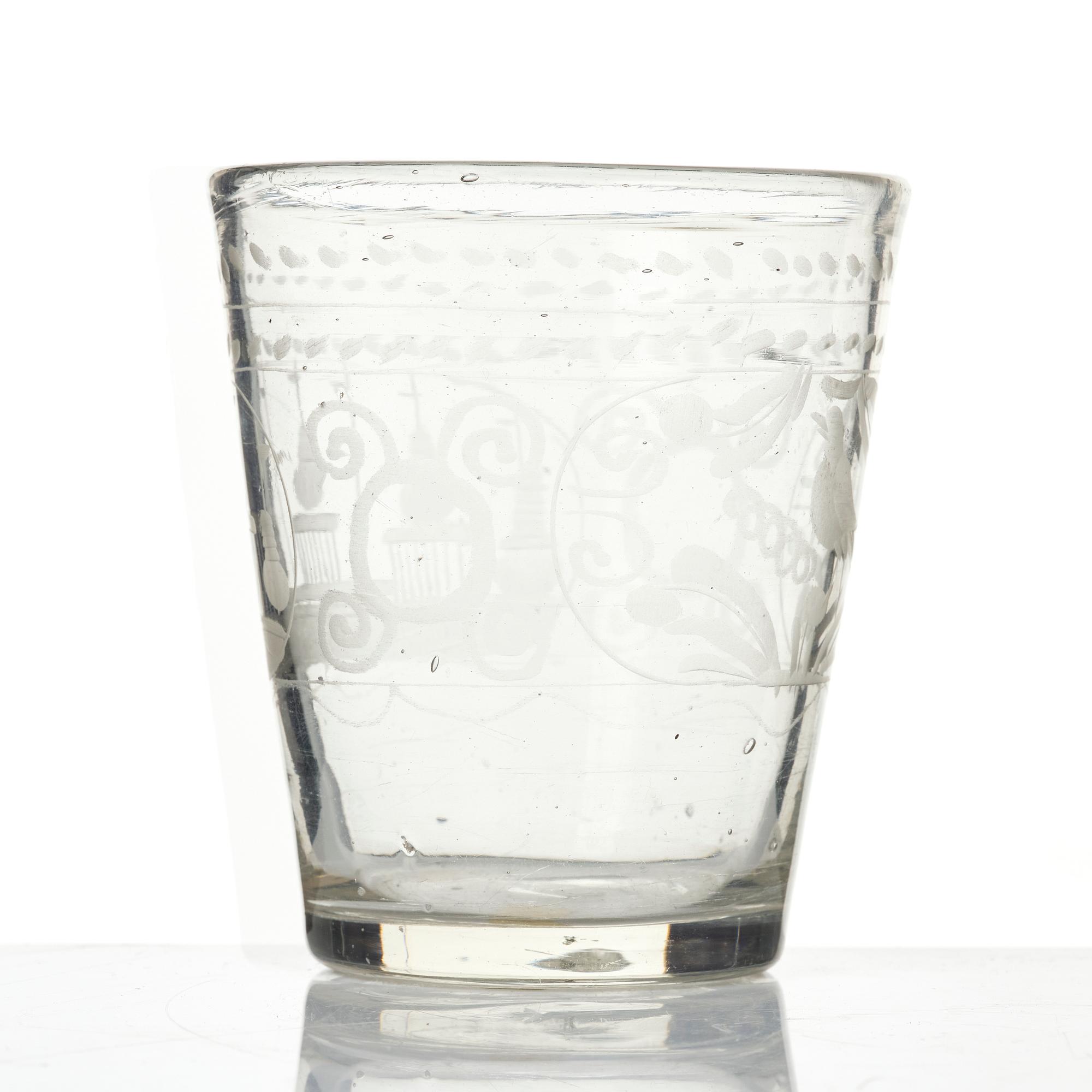 An engraved glass goblet, 18th century.