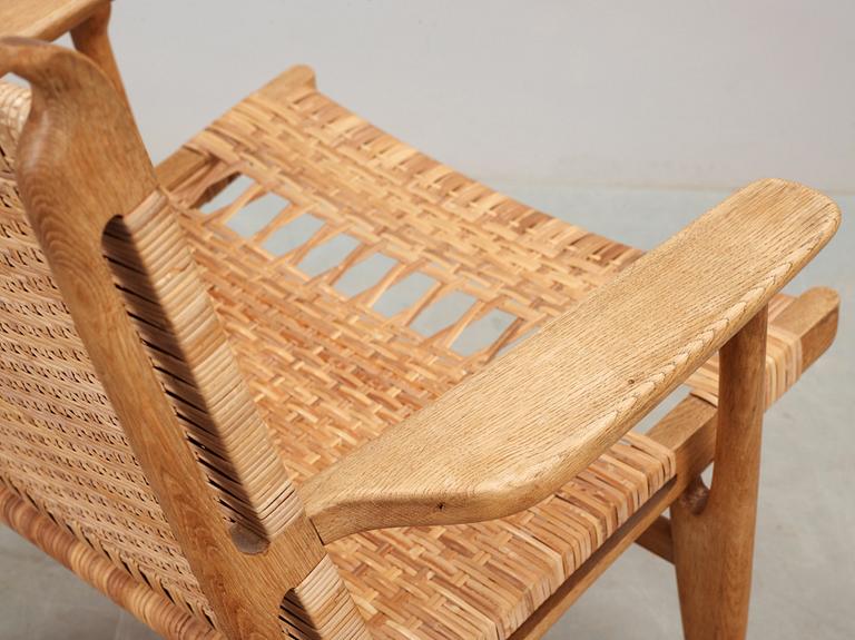 A Hans J Wegner 'CH-27' oak and rattan armchair, Carl Hansen & Son, Denmark 1950's-60's.