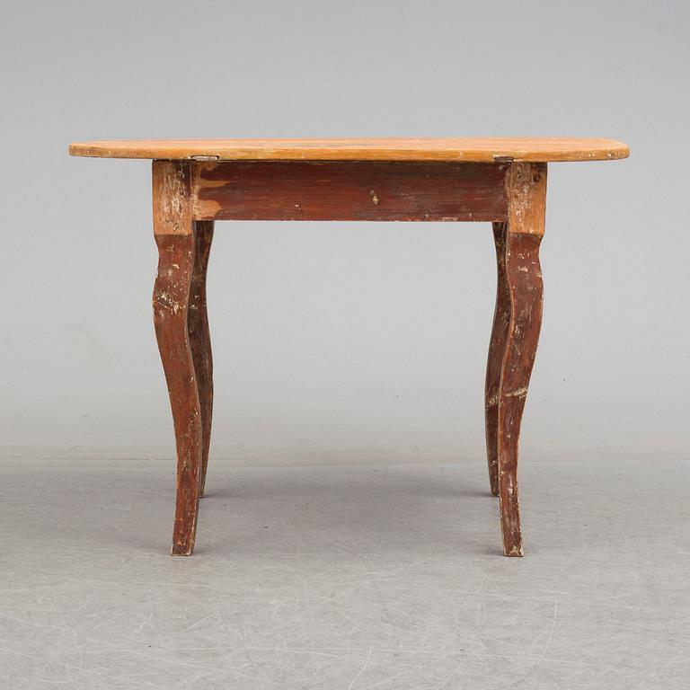 A provincial pine Rococo table, 18th/19th Century.