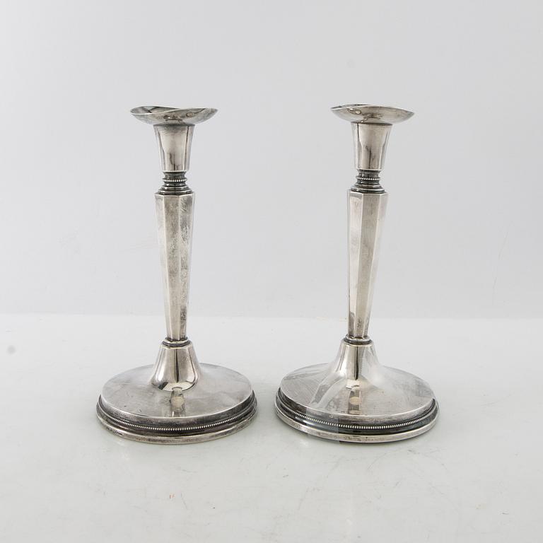 Eric Löfman, candlesticks, a pair, silver, MGAB, Uppsala, 1974.