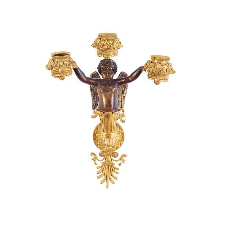 A pair of Empire early 19th century three-light wall-lights.