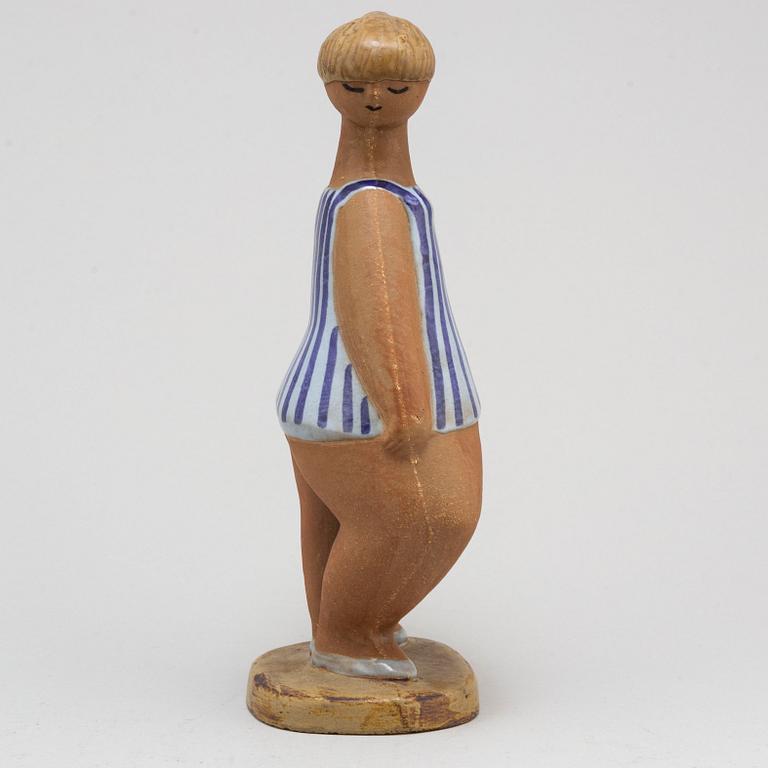 LISA LARSON, a 'Dora' stoneware figurine, from ABC-Flickorna, Gustavsberg.