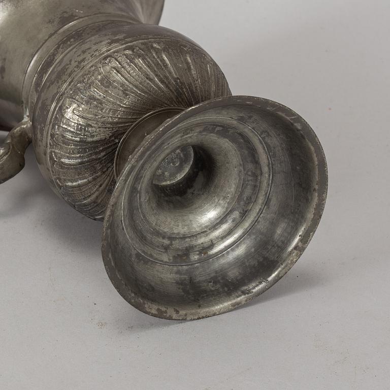A pewter jug, probably 17th century.