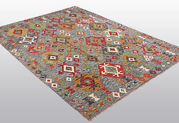 A rug, kilim, ca 244 x 174 cm.