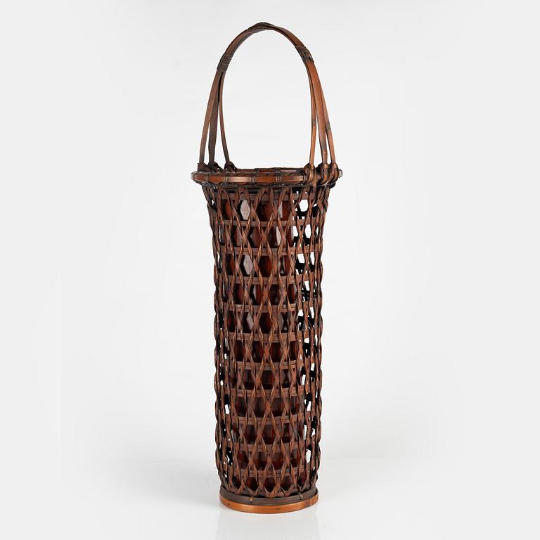 A Japanese Ikebana flower basket, 20th Century. Signed.