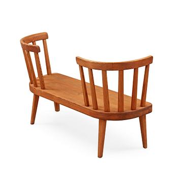 An Axel Einar Hjorth 'Utö' stained pine sofa, Nordiska Kompaniet, Sweden 1930's.