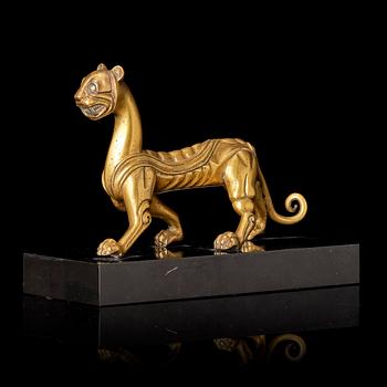 An elegant gilt bronze sculpture of a tiger, Six dynasties, or earlier.