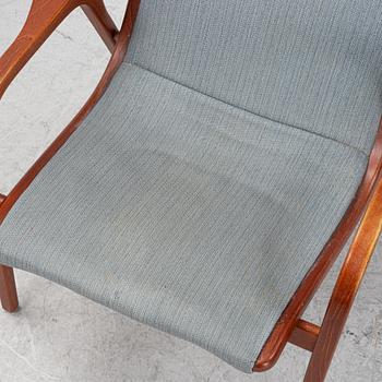 Yngve Ekström, a oair of 'Lamino' armchairs with ottomans, Swedese.