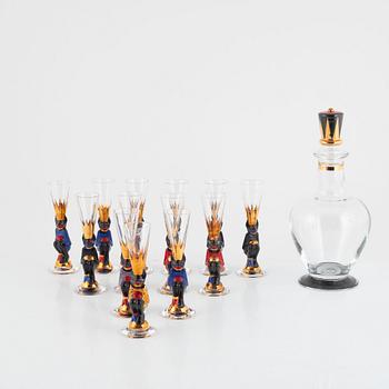 Gunnar Cyrén, carafe and 13 schnapps glasses from the Nobel Service, Orrefors, late 20th century.