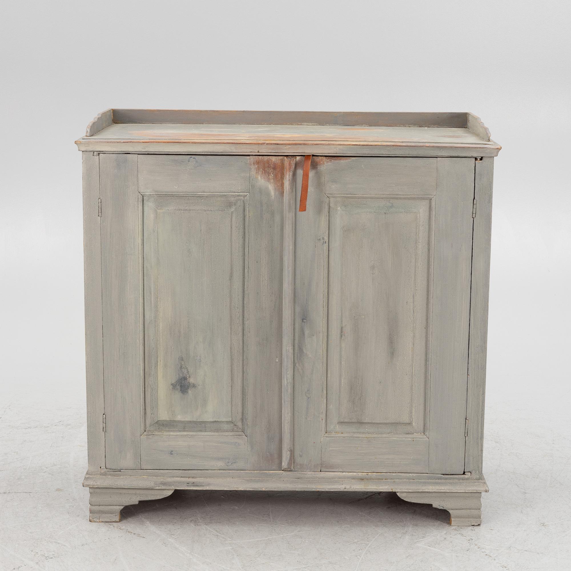 A Gustavian cupboard, circa 1800.