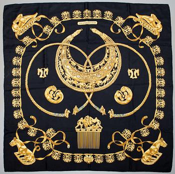 99. A Hermès silk scarf, "Les Cavaliers d'Or".
