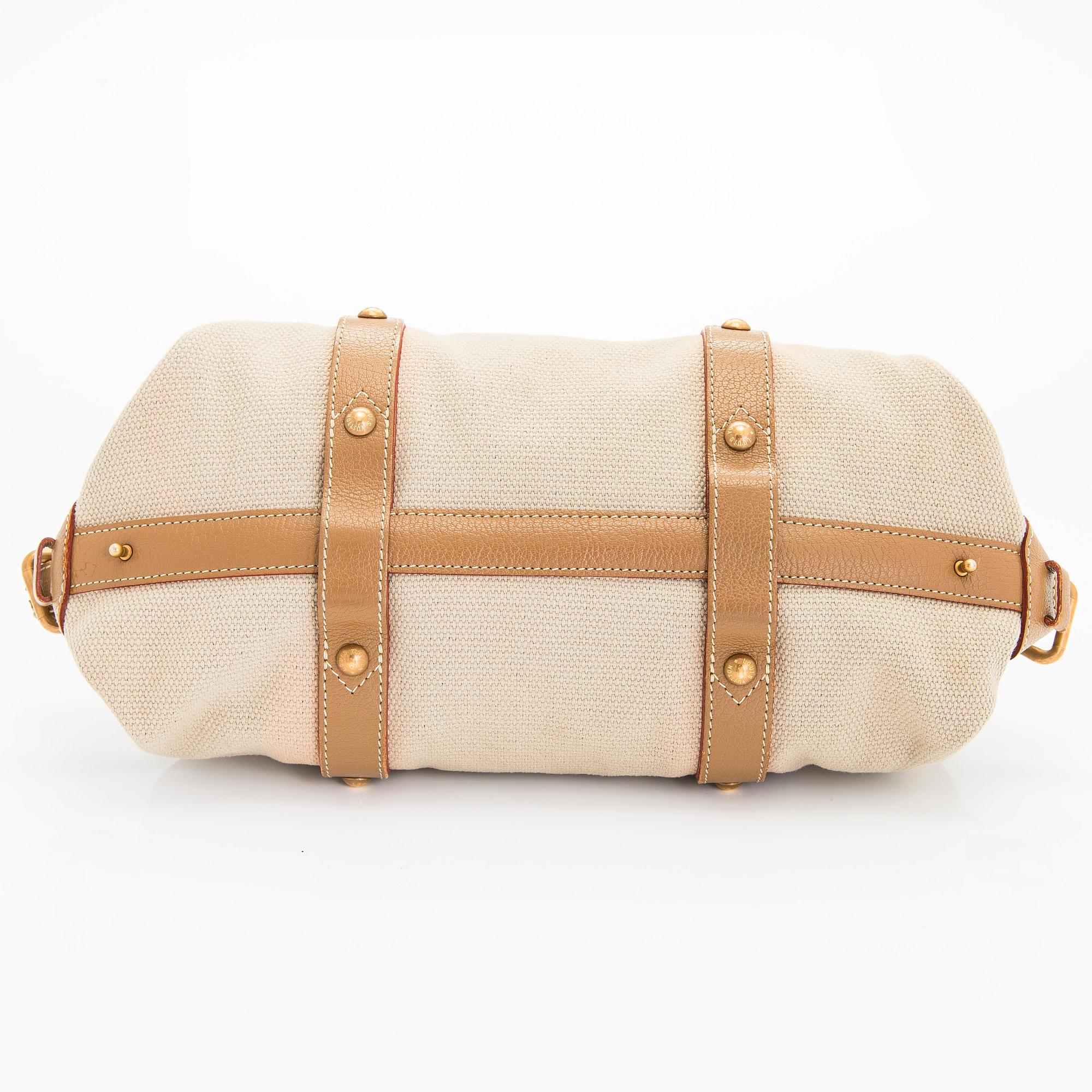 Louis Vuitton a Sac de Nuit Toile Trianon GM bag. Bukowskis