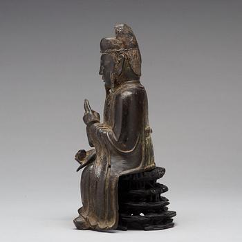 A bronze sculpture of a daoist dignitary, Ming dynasty (1368-1644).