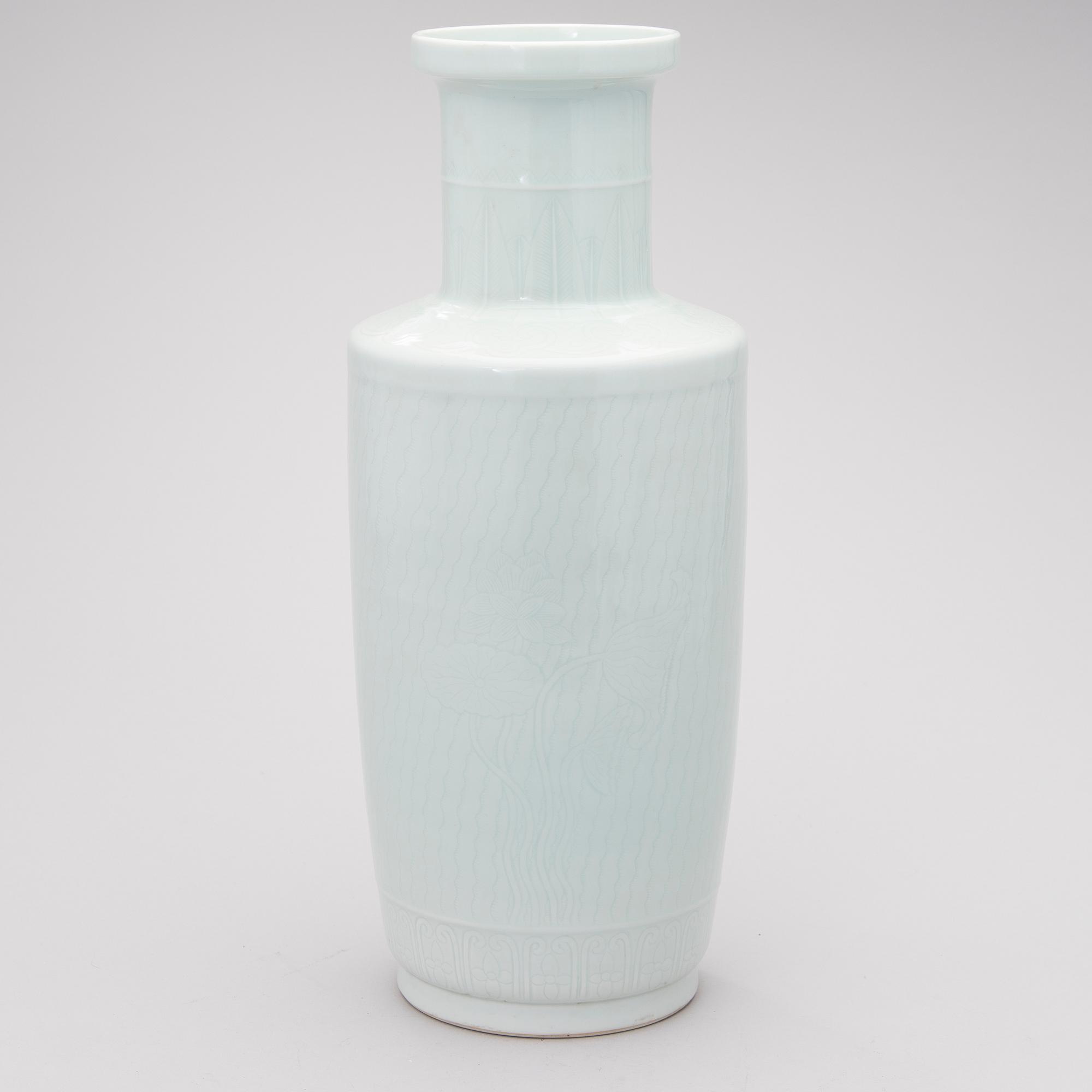 A light-green glazed ceramic vase.