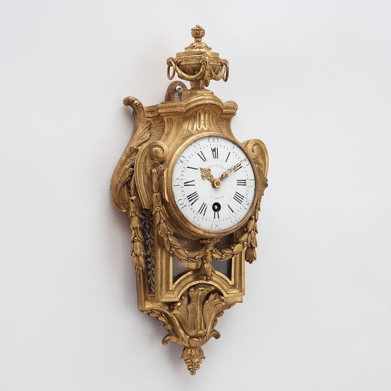 A Louis XVI 1770's gilt bronze wall clock.