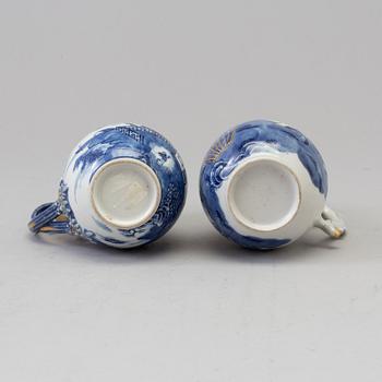 Two blue and white milk jugs with covers, Qing dynasty, Qianlong (1736-95).