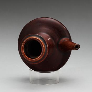 A chesnut brown glazed kendi, Yuan dynasty (1280-1368).