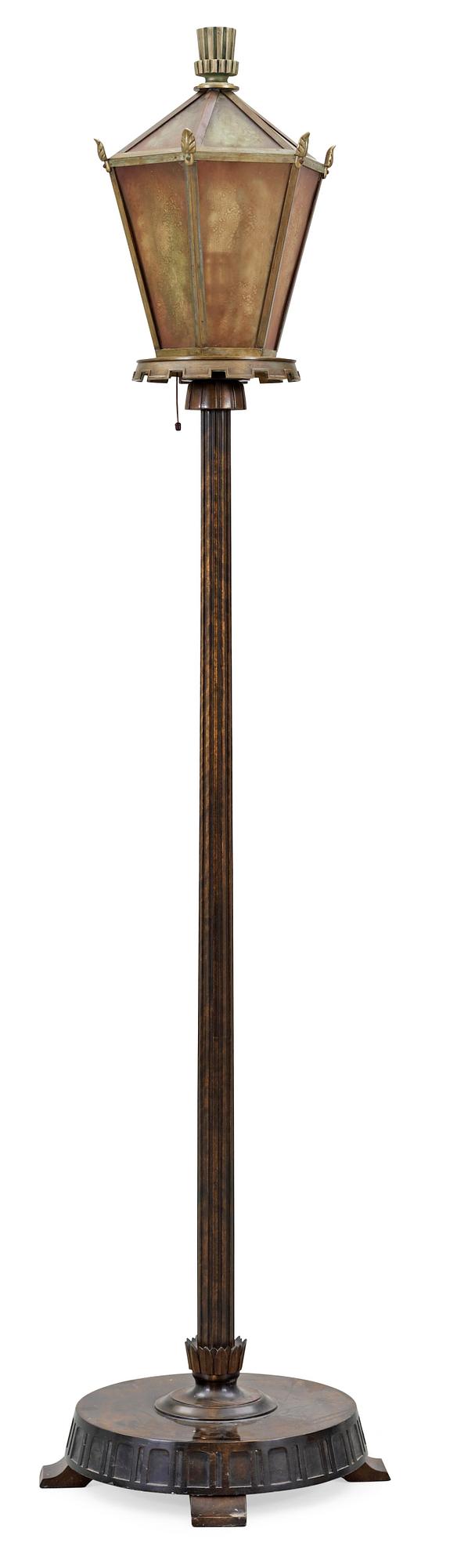 A 1930's floor lamp, the base of stained birch,