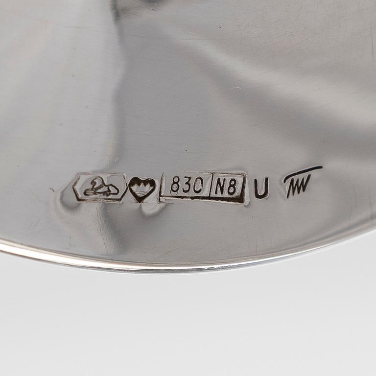 Tapio Wirkkala, A set of four silver candlesticks, "Trumpetti", Kultakeskus, Hämeenlinna 1979 and 1990.