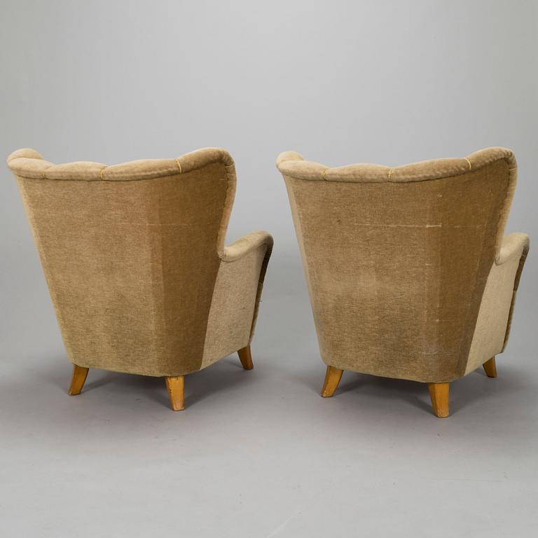 A pair, ofmid-20th century armchairs.