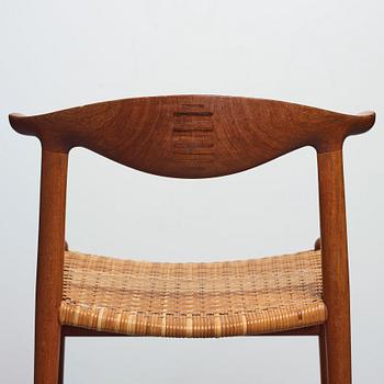 Hans J. Wegner, a set of six teak and rattan "Cowhorn Chairs" "JH-505", executed by cabinetmaker Johannes Hansen, Denmark 1950-60's.