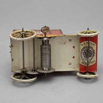 CHOKLADAUTOMAT samt LEKSAKSBIL, plåt,  Tyskland, bl a Lehmann, 1900-talets första hälft.
