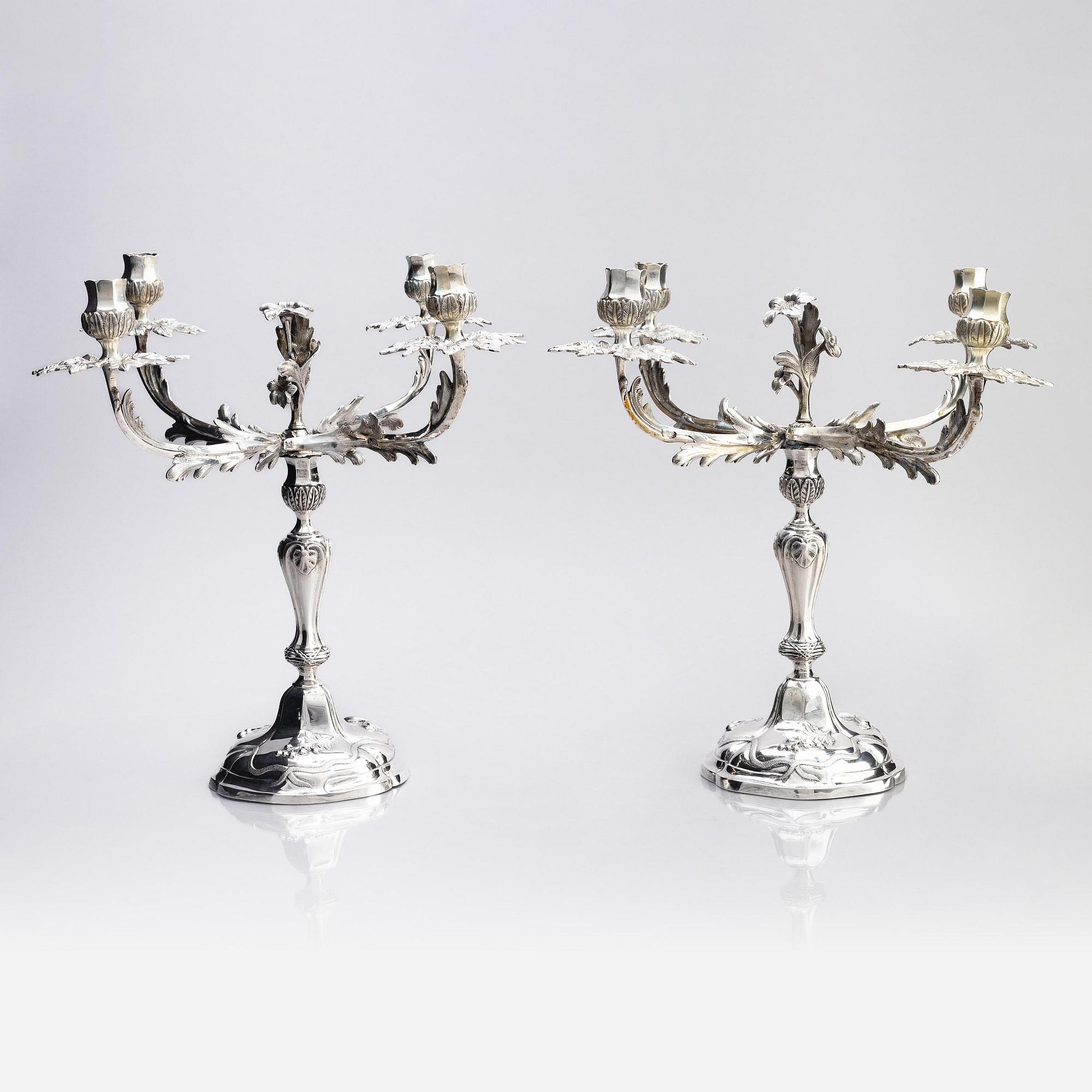 A pair of German 18th century silver candelabras, mark of C.C. Papcke, Stralsund.