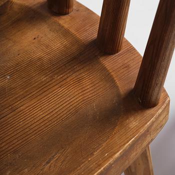 Axel Einar Hjorth, a set of six stained pine "Utö" chairs, Nordiska Kompaniet, Sweden, 1930s.