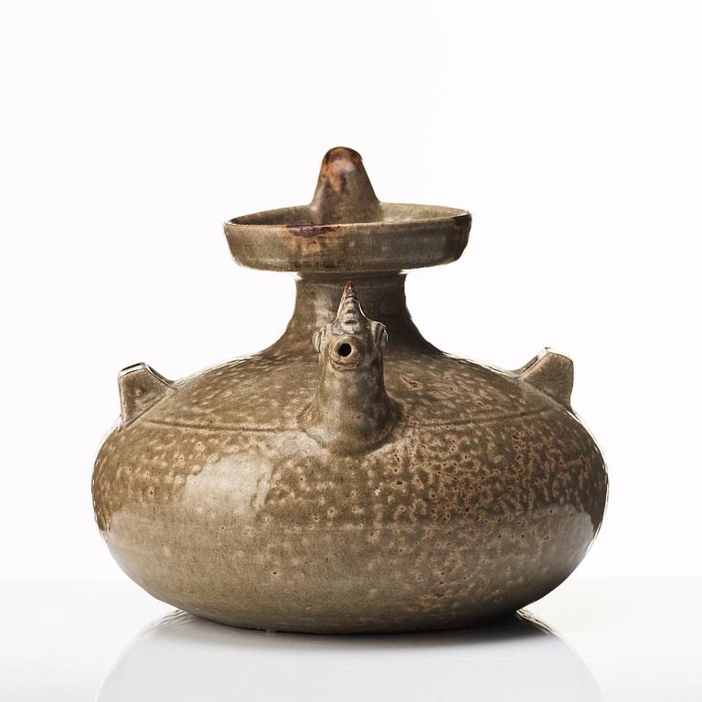 A olive green glazed wine jar, probably Jin/Six dynasties (265-420).