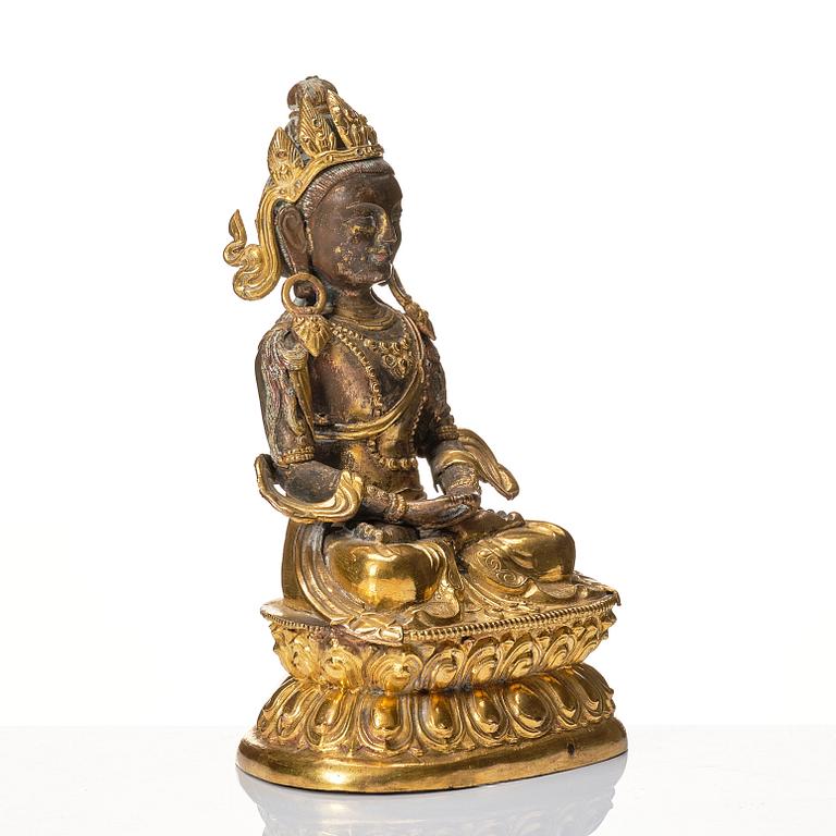 A Mongolian, partly gilt reoussé sculpture of Amitayus, 19th Century.