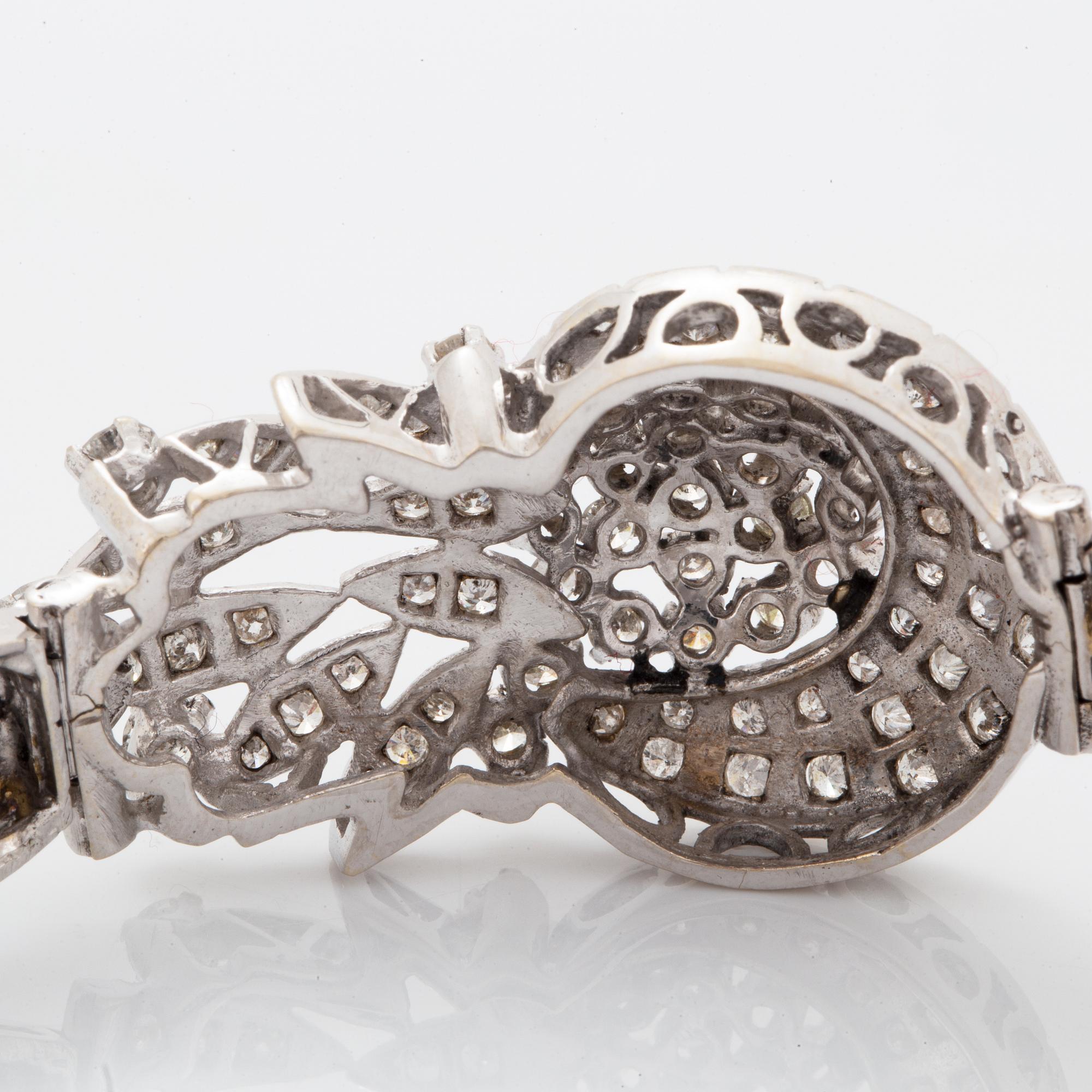White gold and brilliant-cut diamond bracelet.