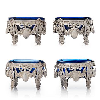 A set of four French silver and blue glass salt-cellars, mark of GA Jacob, Paris 1778.