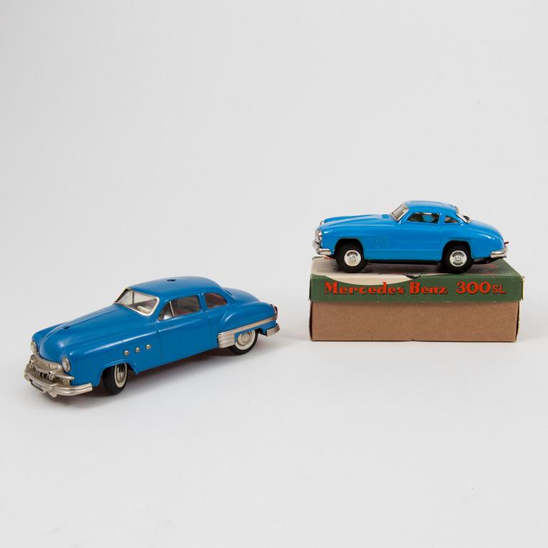 Two tinplate cars by Schuco and Kato Sairen German and Japan 1950s.