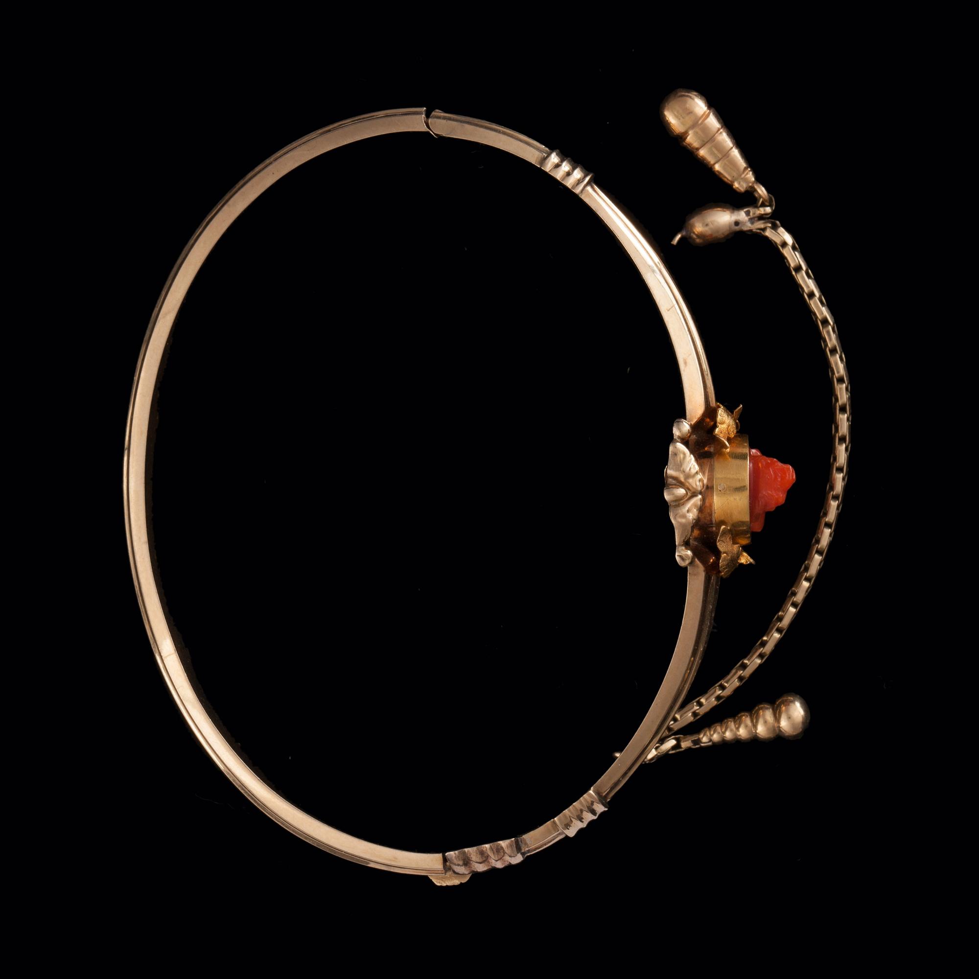A carved coral cameo bracelet.