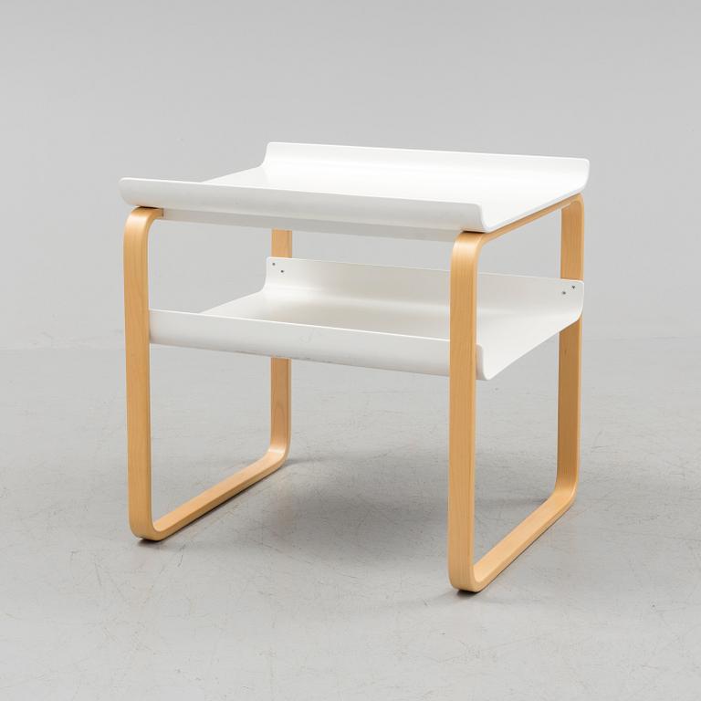 An occational table model 915 by Alvar Aalto for Artek.